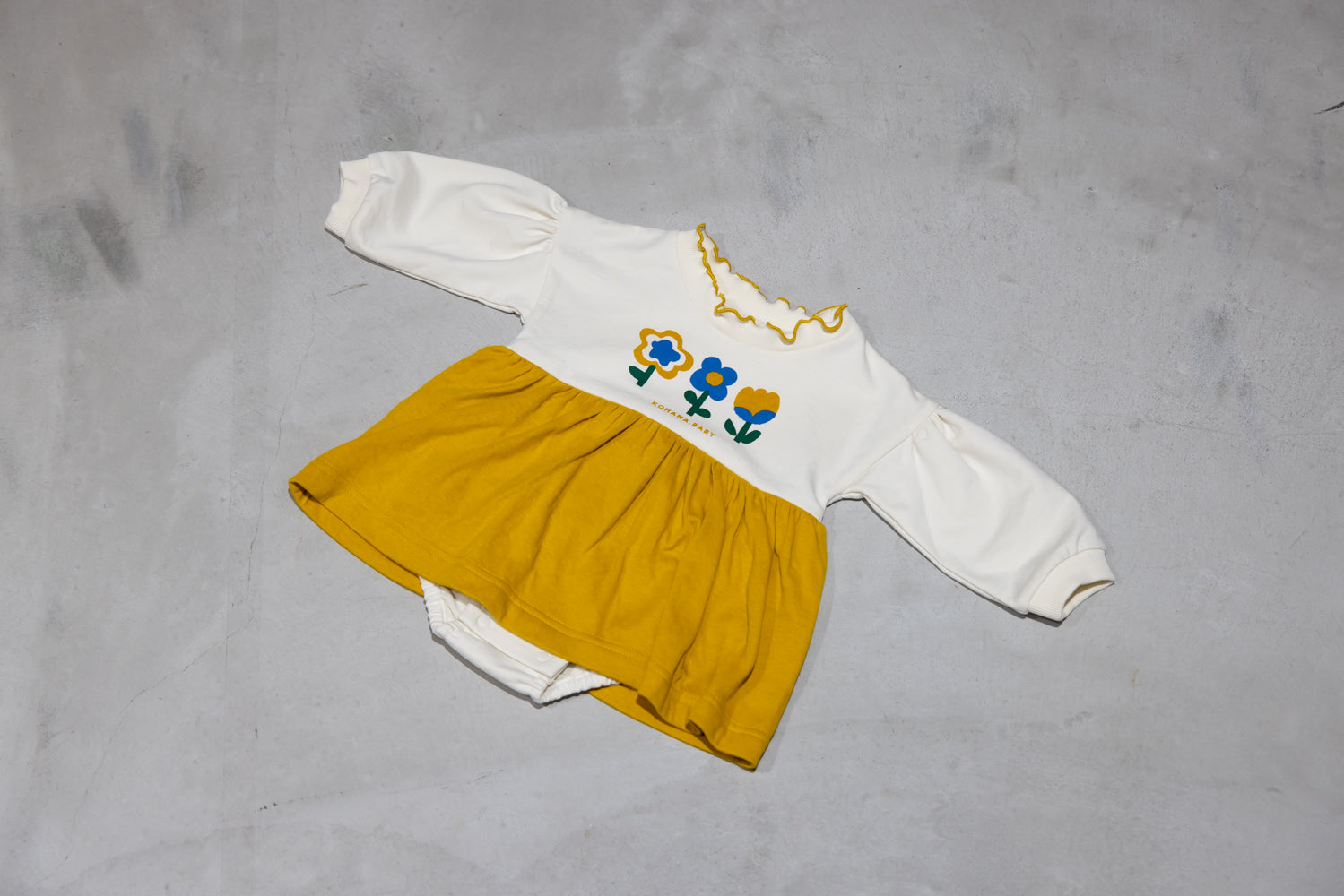 (予約商品)お花のスカート付きロンパース【110079】(Mustard)